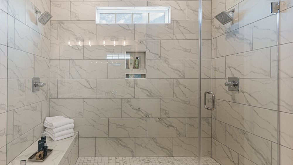 Shower at EnclaveSouthPointe by DRB Homes