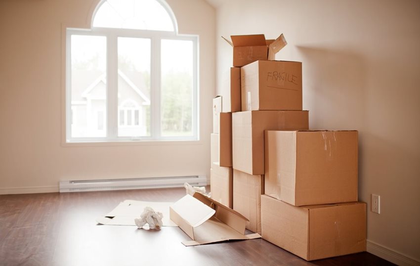 new home moving stack of boxes